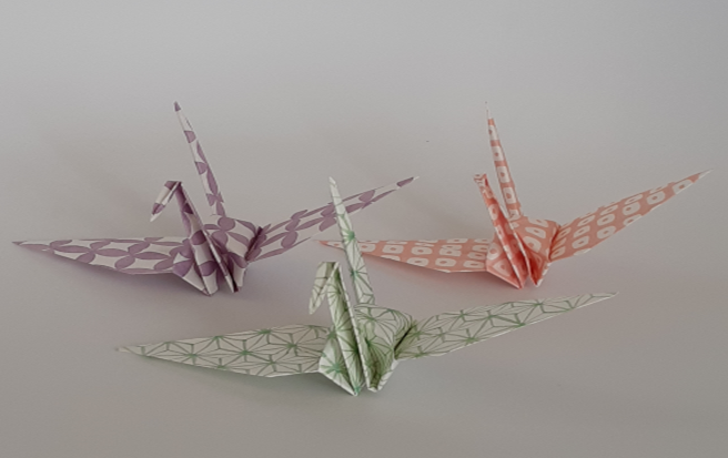 Three origami paper cranes